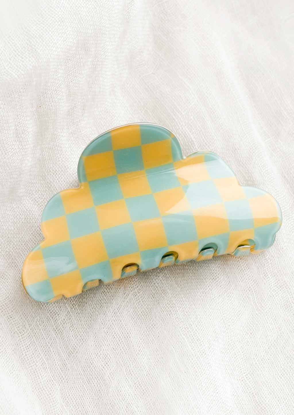 Mint / Yellow: A cloud shaped hair claw in yellow and aqua checker.