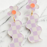 Lavender Multi: A pair of purple checker print earrings in wavy flower shape.