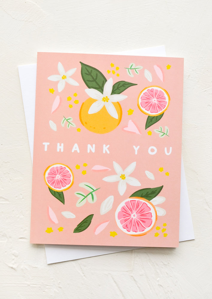 1: A greeting card with illustration of citrus slices and "Thank you" written at middle.