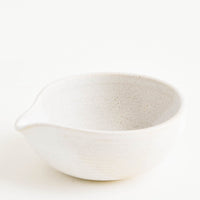 Warm White: An ivory spouted ceramic bowl.