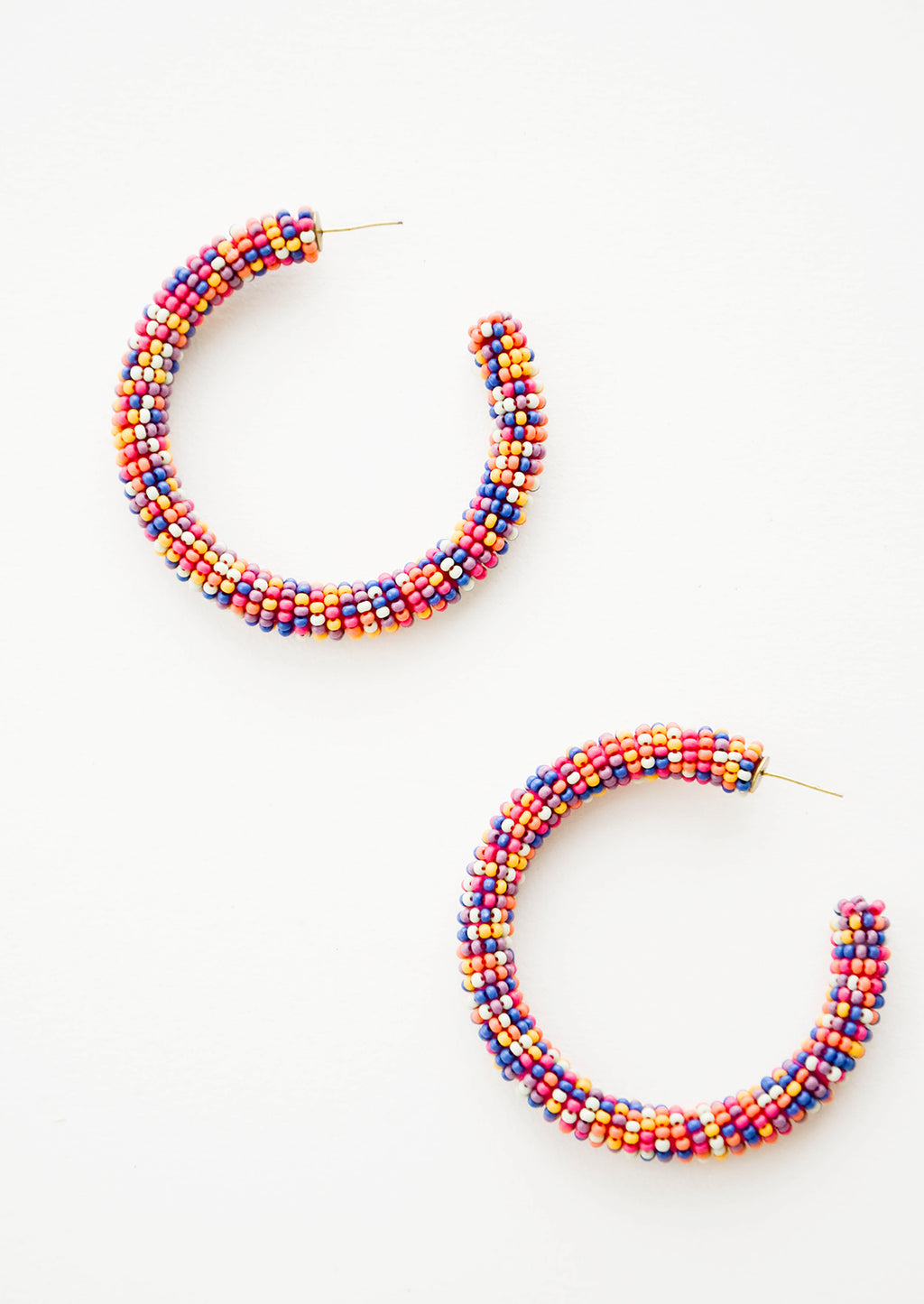 1: Mixed multicolored beaded hoop earrings. 