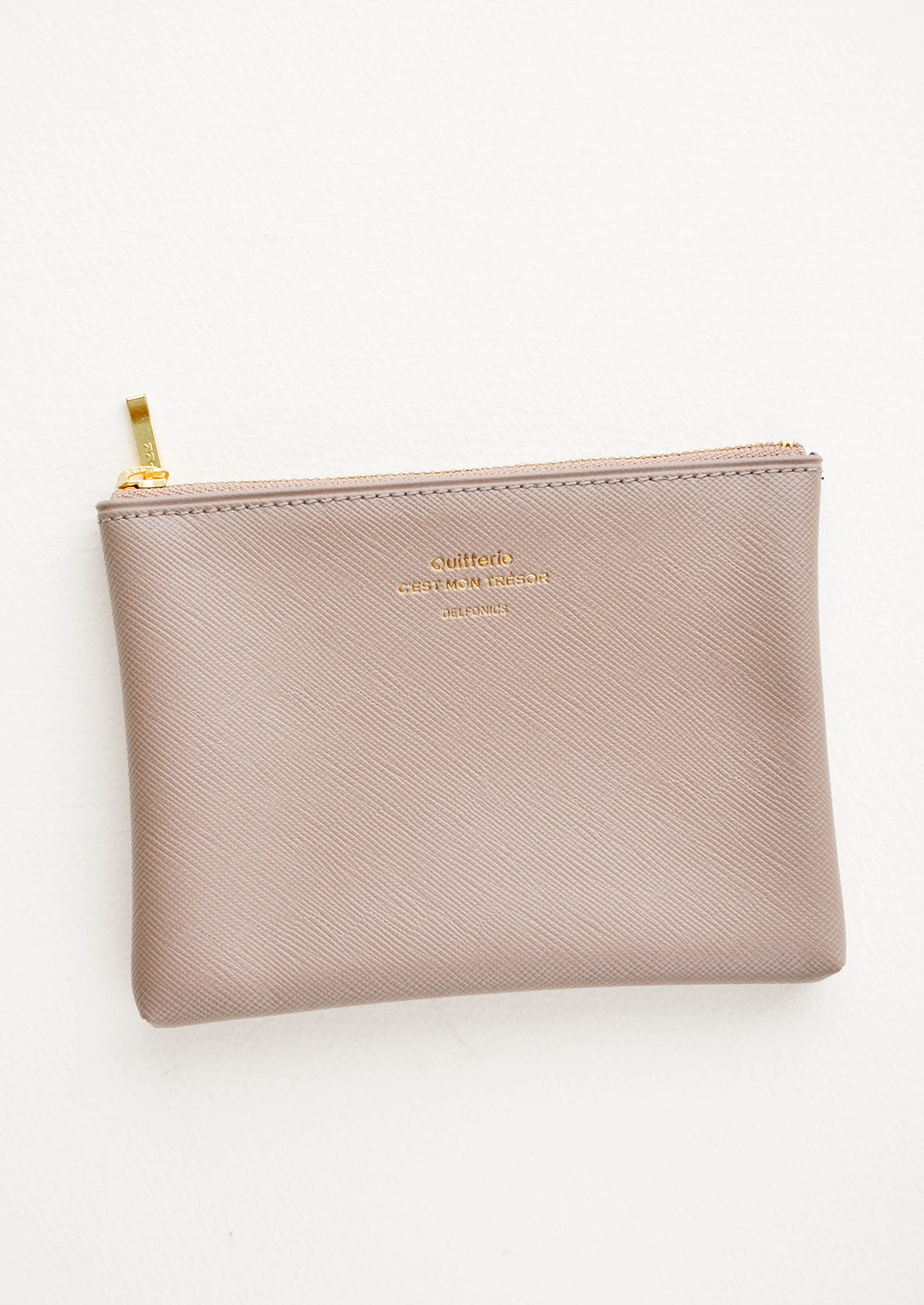 Small vinyl coin pouch with gold zipper and crosshatch texture, in grey.