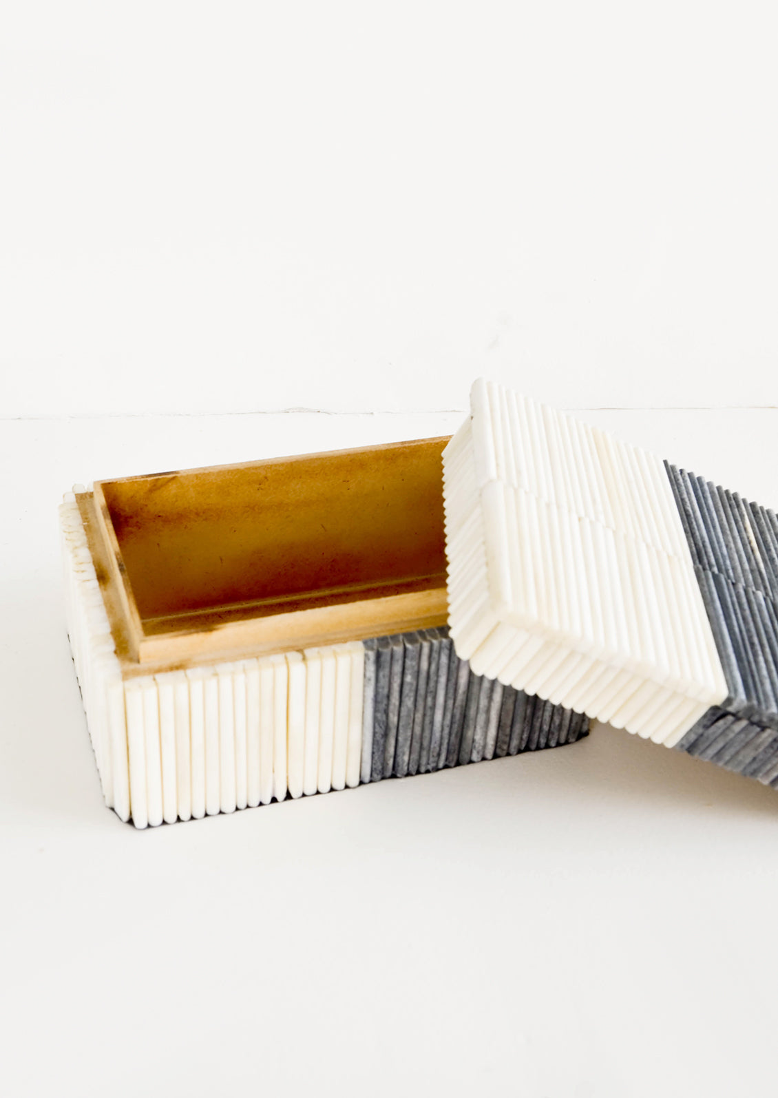 Rectangular, decorative lidded storage box in two-tone design