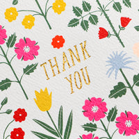 Single Card: A set of thank you cards with vibrant floral pattern and gold "Thank You" text at center.
