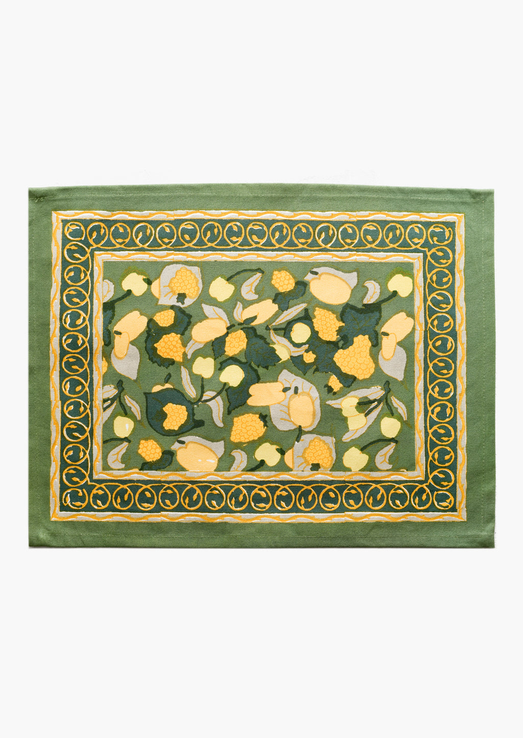 2: A block printed placemat in green and yellow fruit print.