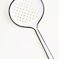 2: Enamel strainer utensil in white with painted black edging