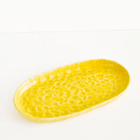 Daybreak: Dapple Textured Oval Shaped Ceramic Trays in Yellow  - LEIF