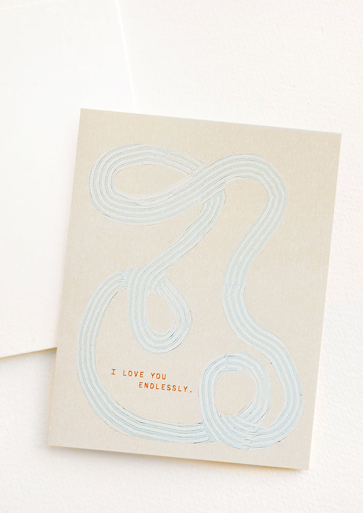 1: A greeting card with looping shape, text reads "I love you endlessly".