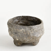 Brown: Small, decorative paper mache bowl in footed silhouette and brown in color