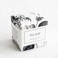 Fig Leaf: A cube-shaped bath fizzy box with black and white botanical graphic packaging.