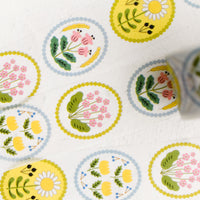 1: Pastel floral print washi tape in oval border shape.