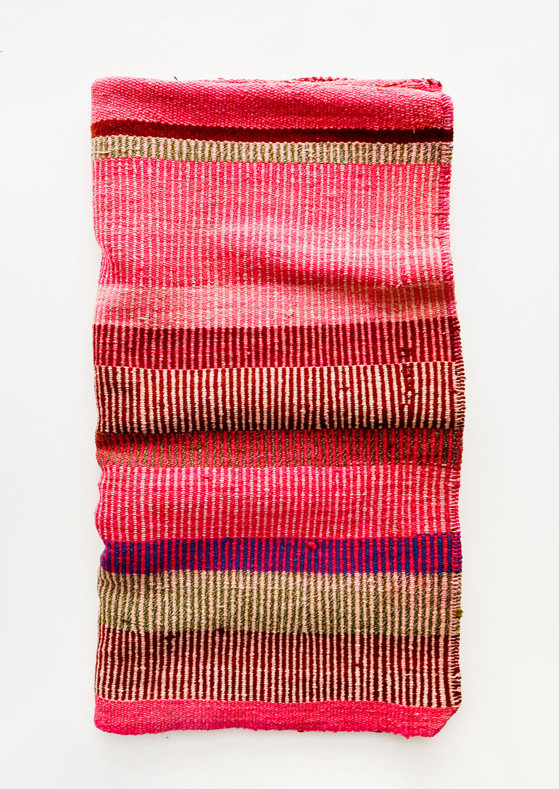 Vintage wool textile in striped pattern in a mix of pink, tan and purple