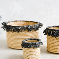 Extra Small / Natural / Grey: Round, natural raffia baskets with dark grey fringed raffia trim around top