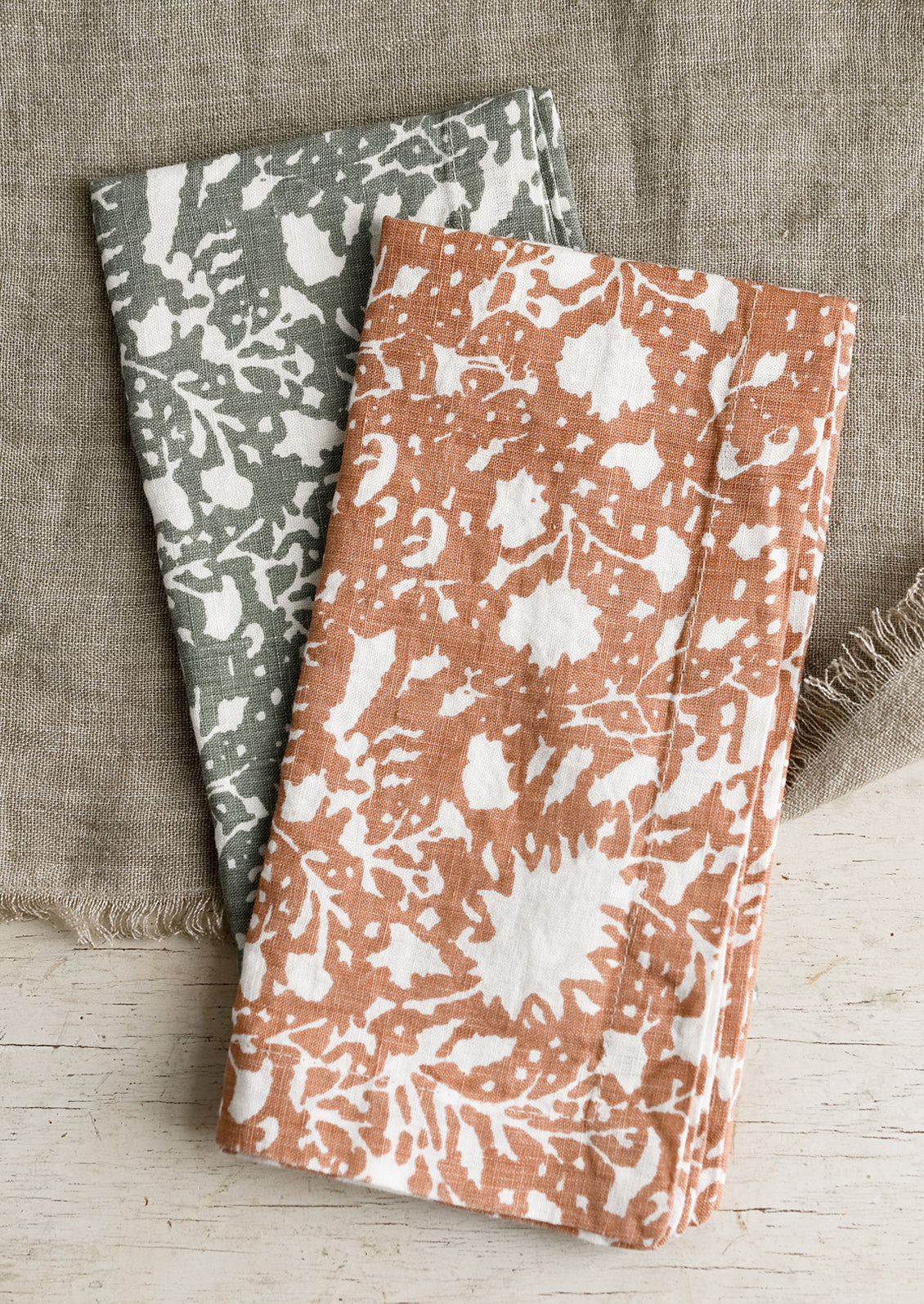 Botanical print linen napkins in two colorways.