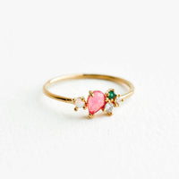 Pink Multi / Size 6: Gold ring featuring slim band with two gemstones and two crystals in pink, green and white hues, prong set in a cluster.
