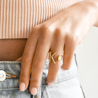 2: Model shot with hand wearing letter K ring.