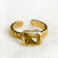 One Size / Citrine: A gemstone ring with heavy chainlink band and rectangular citrine baguette.
