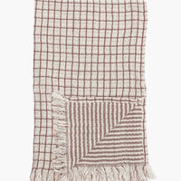 Garnet Gingham: A gingham tea towel in red check with striped reverse side.