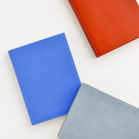 1: Product shot featuring multiple colors of leather notebook.
