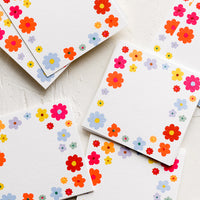 1: Mini square notecards with floral border.