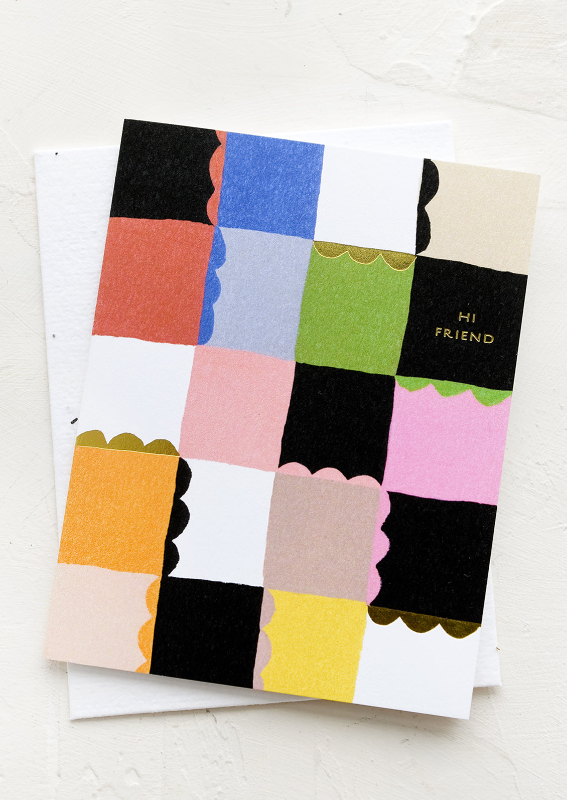 A checkered card reading "Hi Friend".