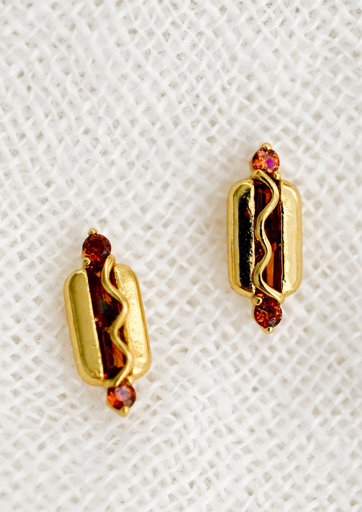1: A pair of gold and crystal earrings in shape of hot dog.