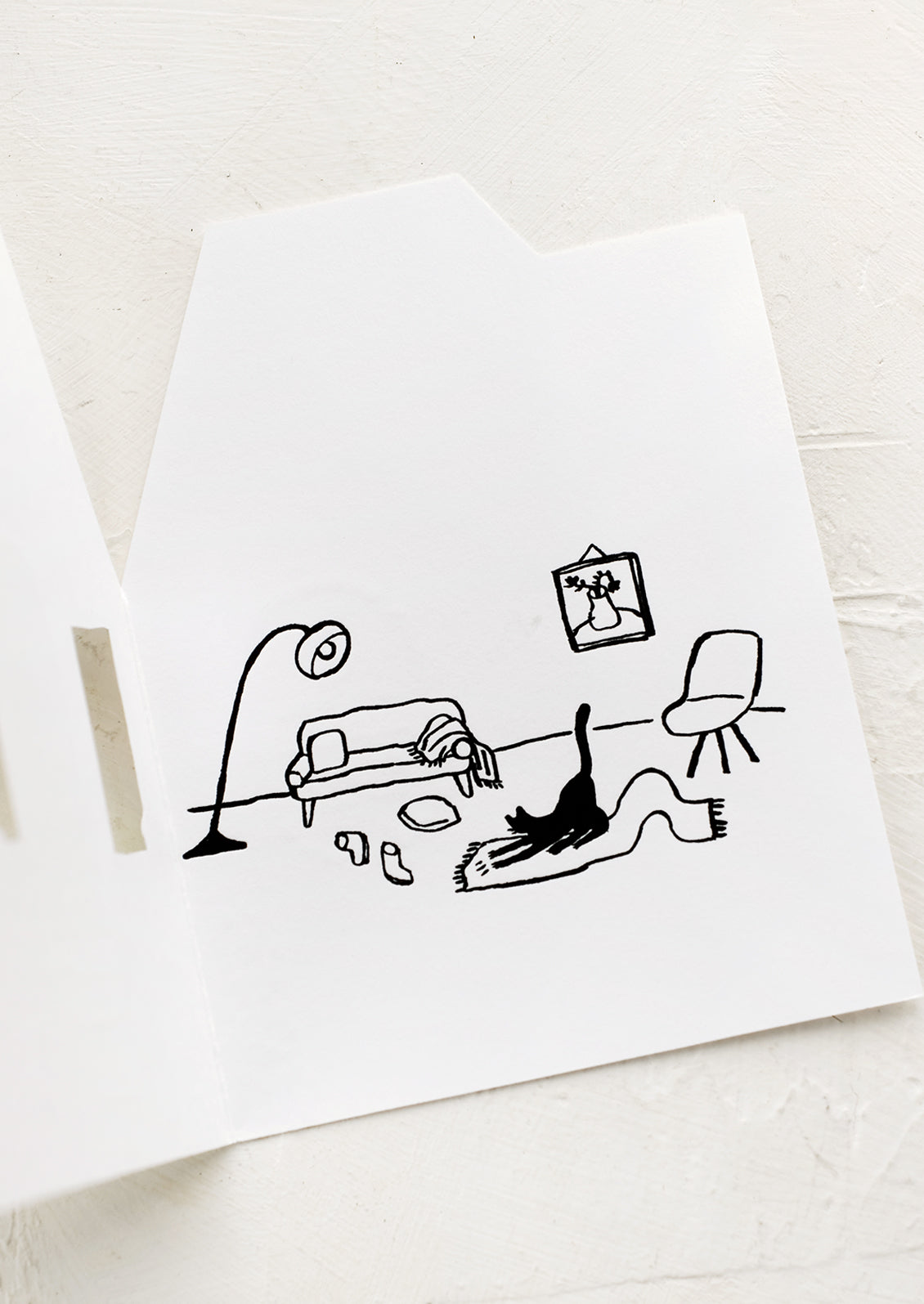 Interior of card with household scene.