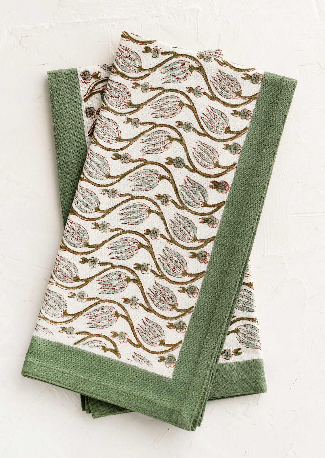 Floral print napkins with ivy green border.