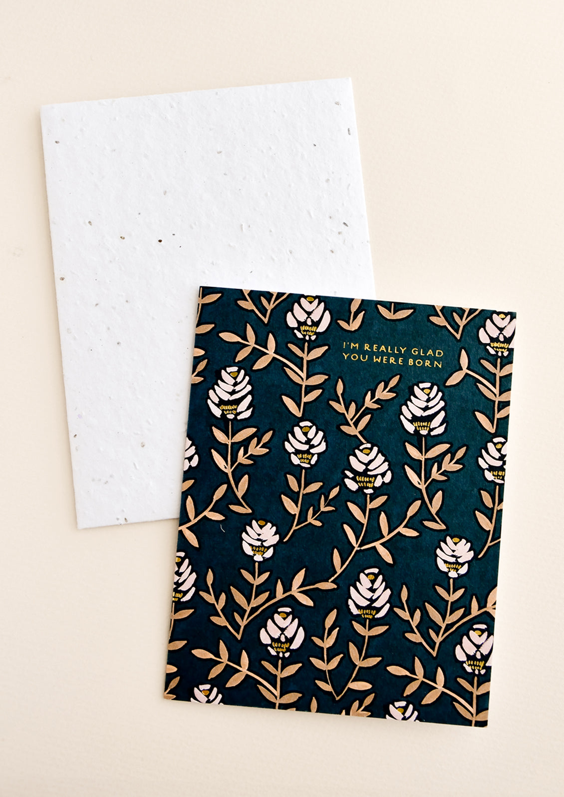 Greeting card with floral print and text reading "I'm Really Glad You Were Born"