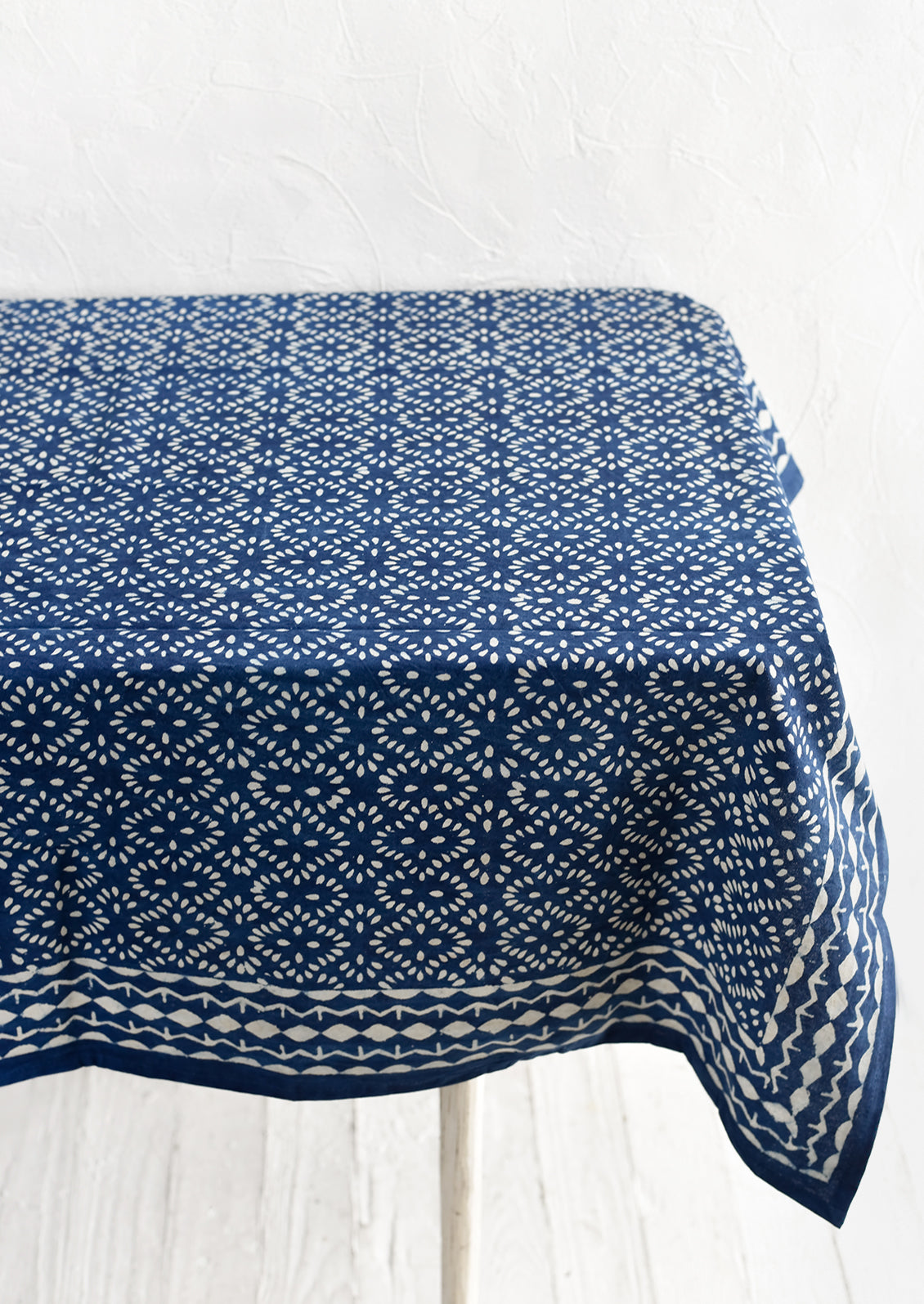 An indigo block printed tablecloth.