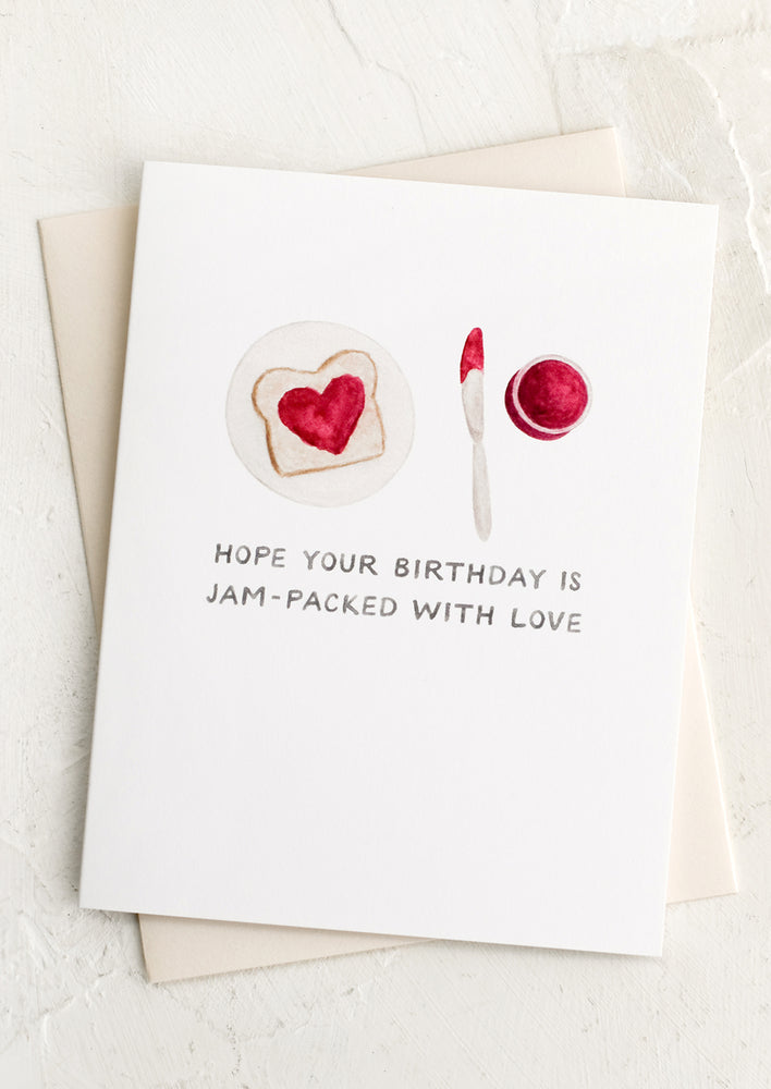 1: A greeting card with illustration of heart-shaped jam on toast, text reads "Hope your birthday is jam-packed with love".