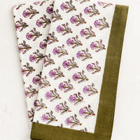 Olive Multi: A pair of block printed floral napkins in olive and purple.