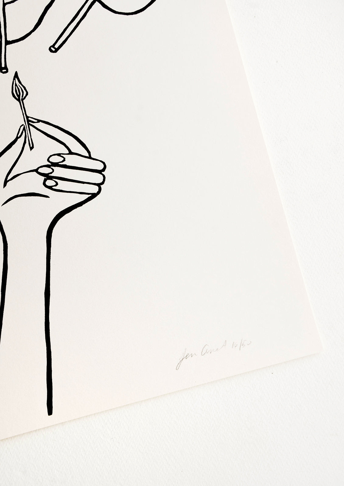 Artist's signature on handprinted artwork