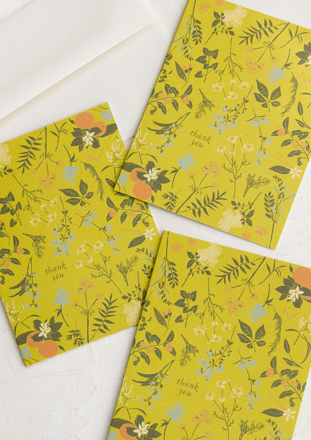 Boxed Set of 8: A chartreuse herb and floral print thank you card set.