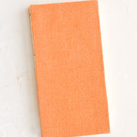 Peach: A cloth-covered notebook in naturally dyed peach hue.