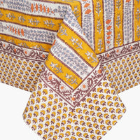 4: A stripe floral print tablecloth in marigold, purple and blue.