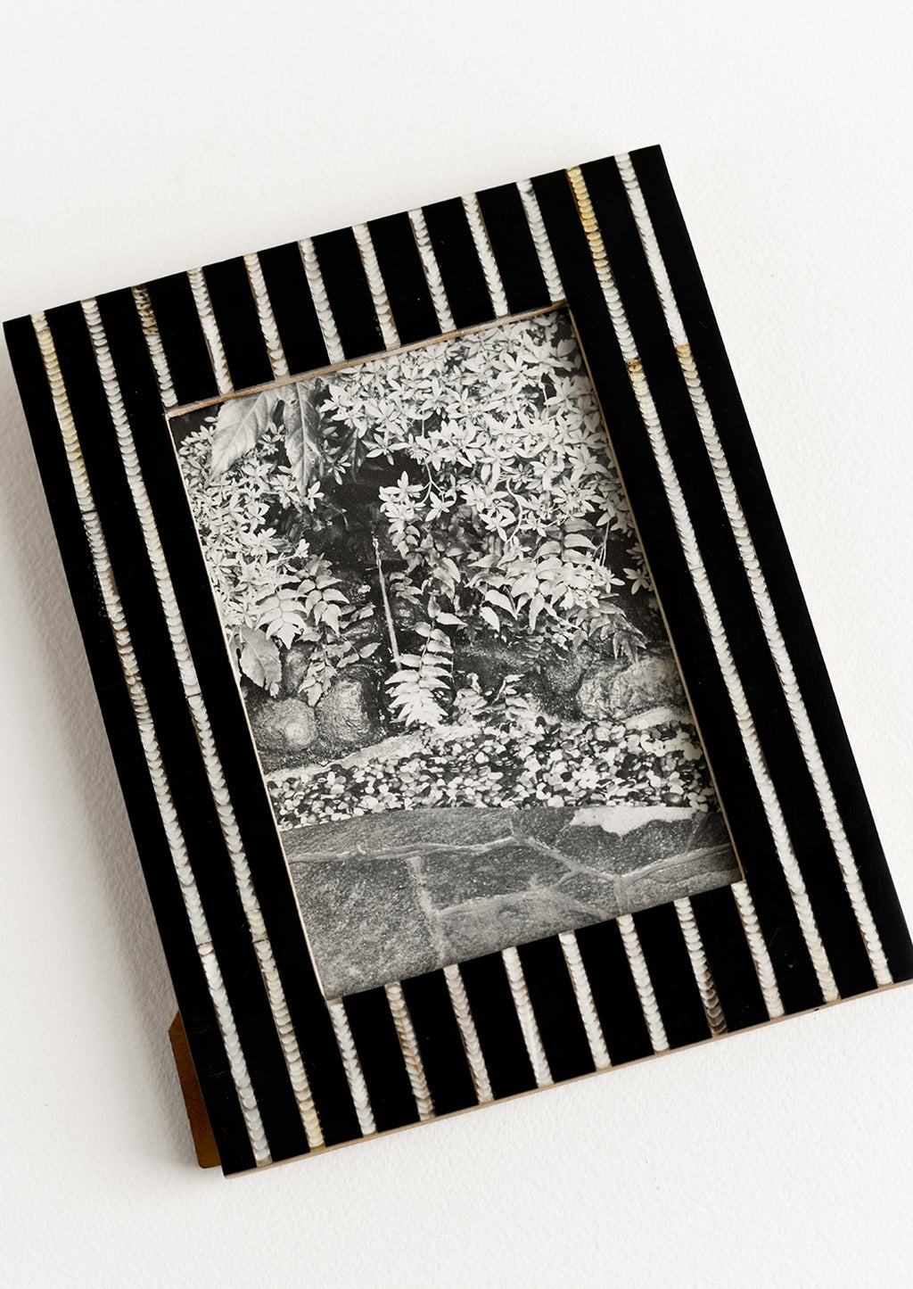 2: A black and white striped picture frame.A black and white striped picture frame.