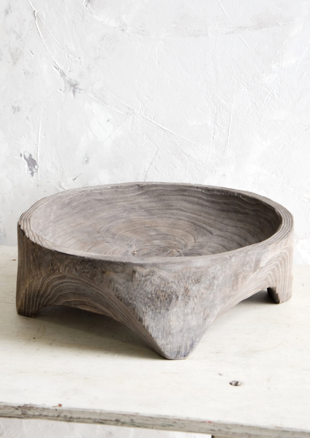 1: Round, primitive style shallow wooden display bowl with chunky footed base
