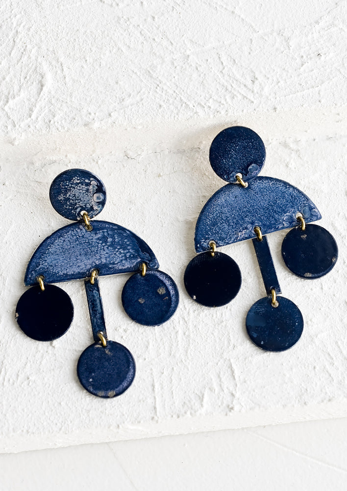 1: A pair of enamel finish earrings in blue with tiered geometric shape.