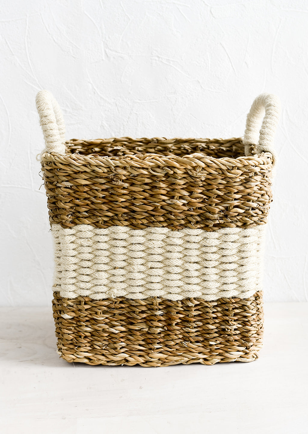 Medium [$85.00]: A square storage basket in woven straw and jute, medium size.