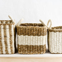 2: Jute and straw storage baskets in incremental sizes.