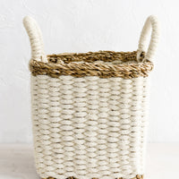Small [$60.00]: A square storage basket in woven straw and jute, small size.