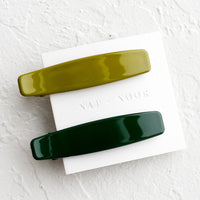 Forest / Olive: A pair of hair clips with one forest green and one olive green.