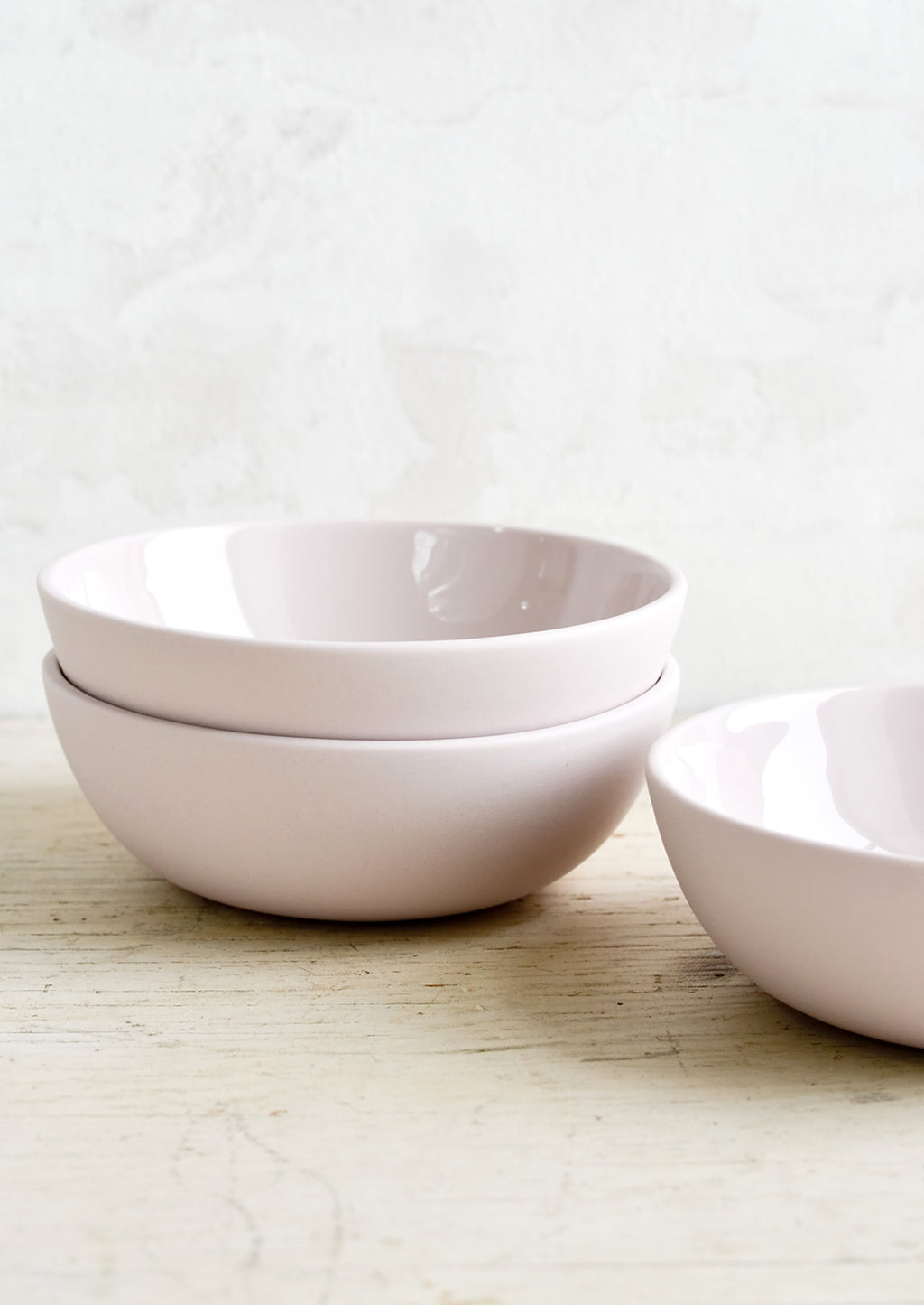 Raspberry Yogurt: Matte porcelain bowls in pale lavender with glossy interior.