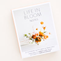 2: Outside of the box of floral notecards featuring text "Life in Bloom".