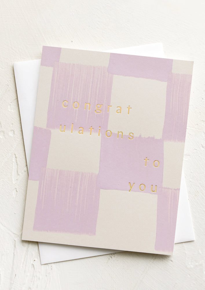 1: A checker print card reading "Congratulations to you".