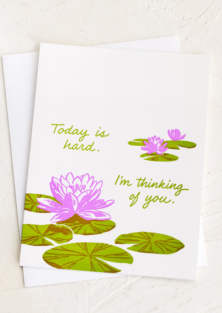 A waterlily print card reading Today is hard, I'm thinking of you.
