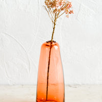 Cherry / Tall: A tall glass bud vase in translucent red-orange.