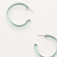 Transparent Aqua: Three quarter hoop earrings in translucent aqua blue acetate.