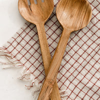 4: A pair of acacia wood salad servers with simple, plain design.